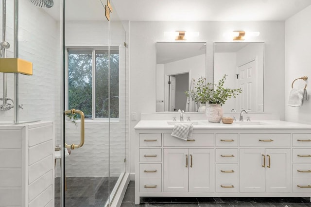 bathroom with vanity and an enclosed shower