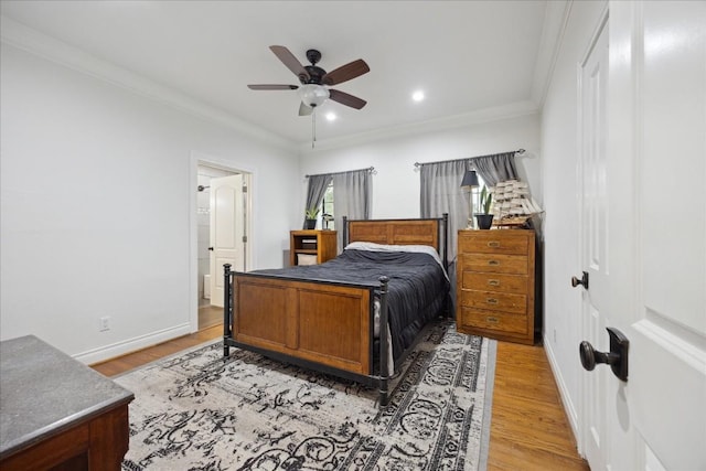 bedroom featuring baseboards, a ceiling fan, light wood-style flooring, ornamental molding, and recessed lighting