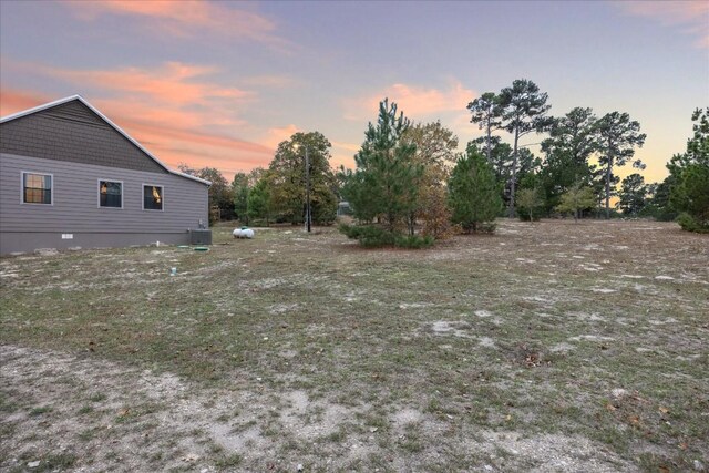 364 Ponderosa Loop, Paige, TX 78659 - view of yard featuring central AC