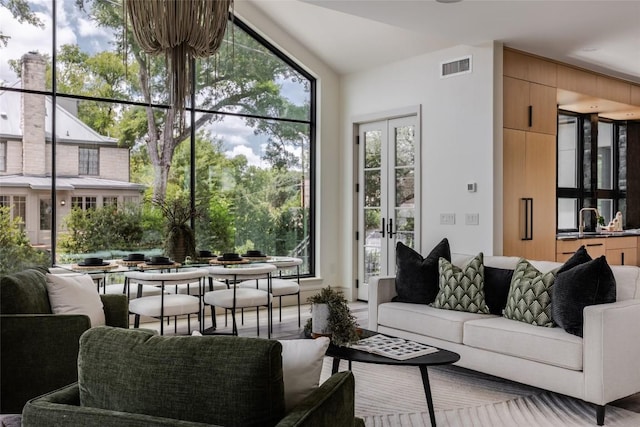 interior space with french doors and a wealth of natural light