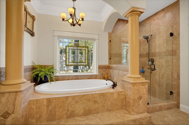 bathroom with a notable chandelier, crown molding, shower with separate bathtub, and decorative columns