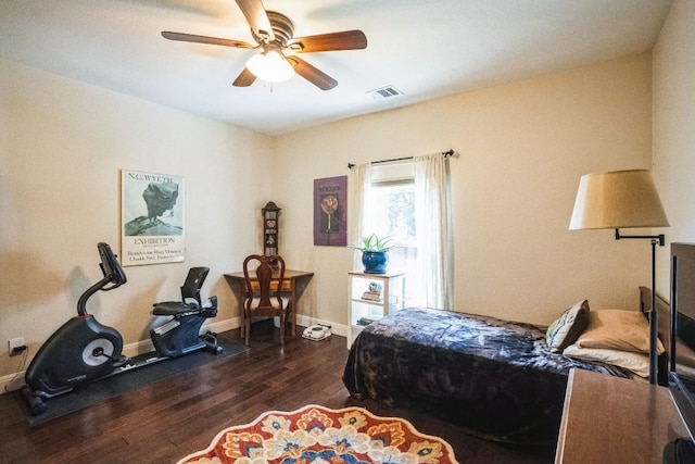 bedroom featuring ceiling fan and dark wood-type flooring