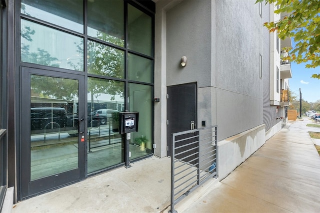 entrance to property with a patio