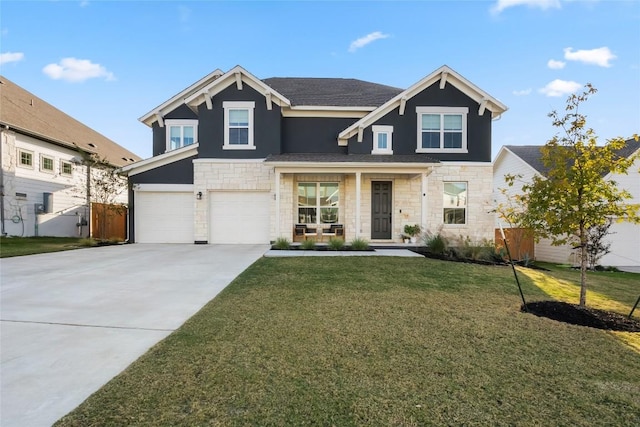 view of front facade featuring a garage and a front yard