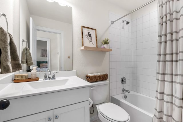 full bathroom with vanity, toilet, and shower / bath combo