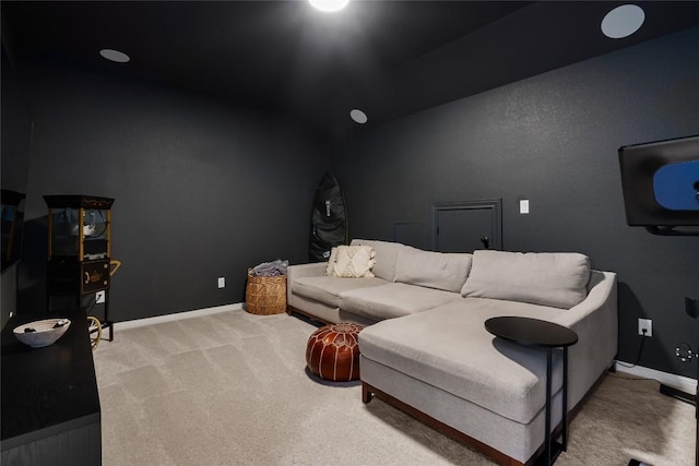 home theater featuring light carpet