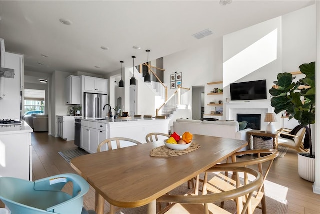 dining space featuring dark hardwood / wood-style flooring