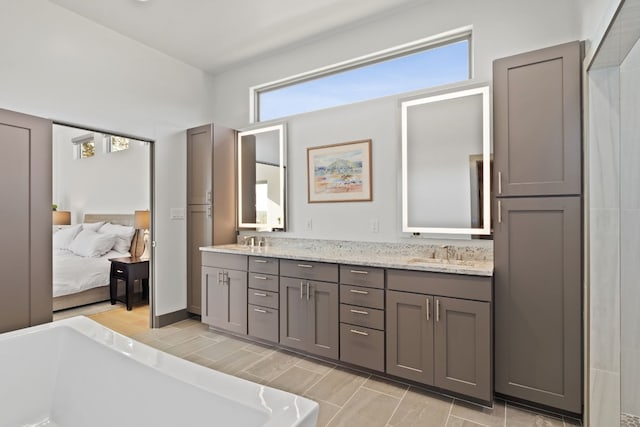 bathroom featuring vanity and plenty of natural light