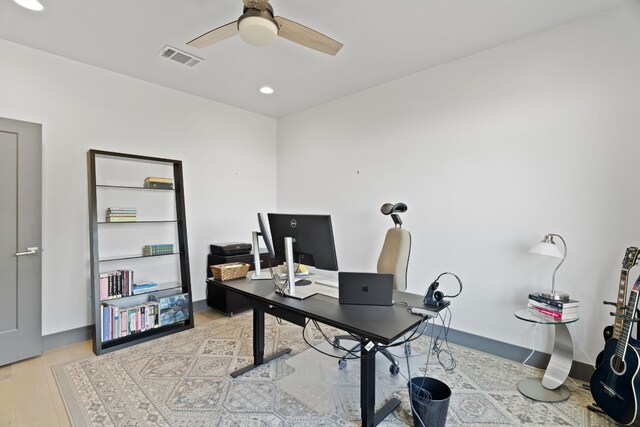 office area featuring hardwood / wood-style flooring and ceiling fan