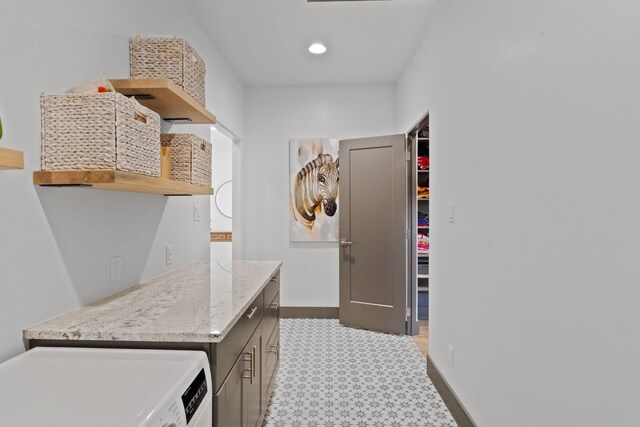 laundry room featuring washer / dryer