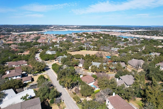 aerial view with a water view and a residential view