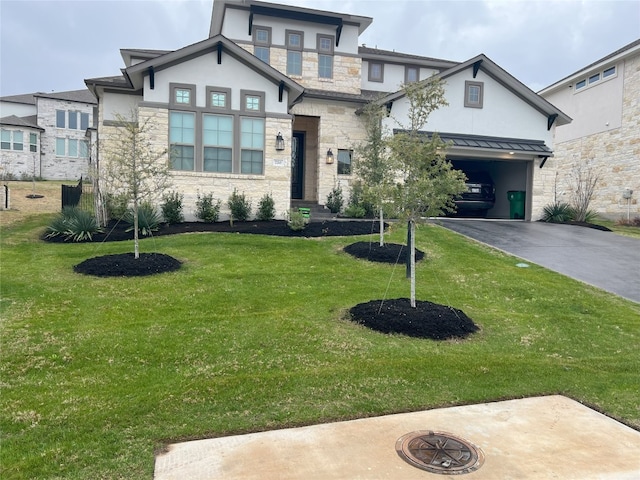 view of front facade featuring a garage and a front yard