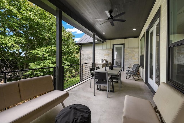 sunroom / solarium with ceiling fan