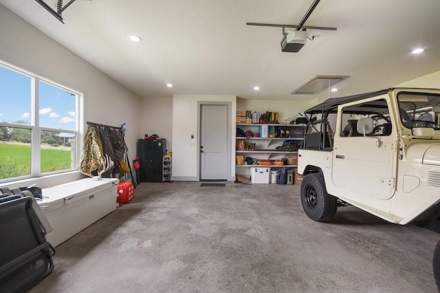 garage featuring a garage door opener