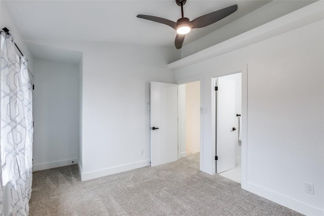 unfurnished bedroom with light carpet and ceiling fan