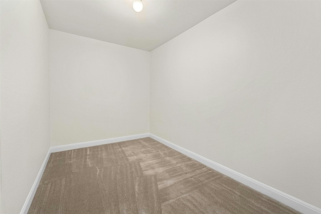 spare room featuring carpet flooring