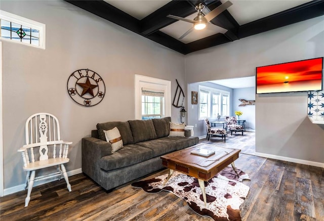 living room with hardwood / wood-style floors, ceiling fan, beam ceiling, and coffered ceiling