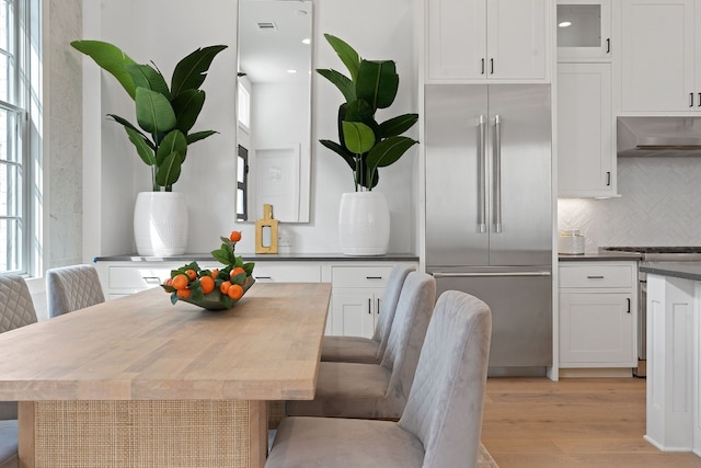 dining space featuring light hardwood / wood-style flooring