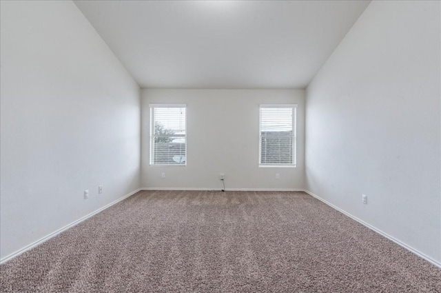 unfurnished room with carpet