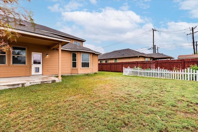 view of yard with a patio area