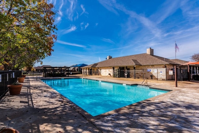 view of swimming pool featuring a patio