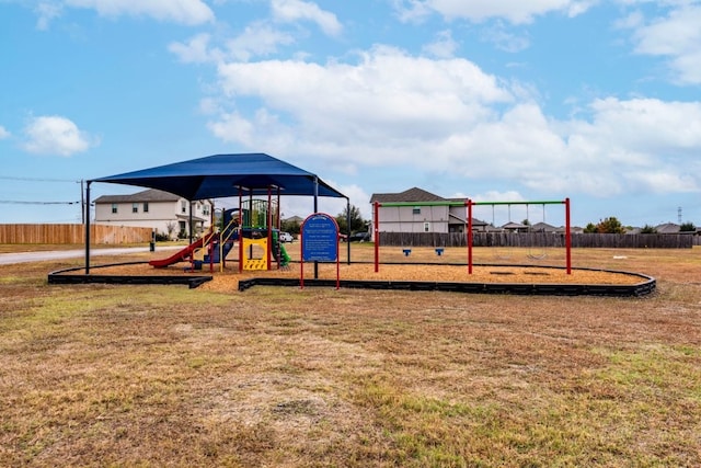 view of play area with a yard