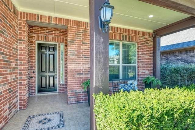 property entrance featuring covered porch