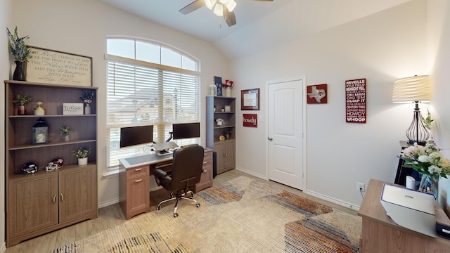 office area featuring light hardwood / wood-style floors, ceiling fan, and lofted ceiling