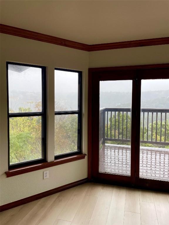 4324 Far W Blvd, Austin, TX 78731 - unfurnished room with light wood-type flooring and crown molding