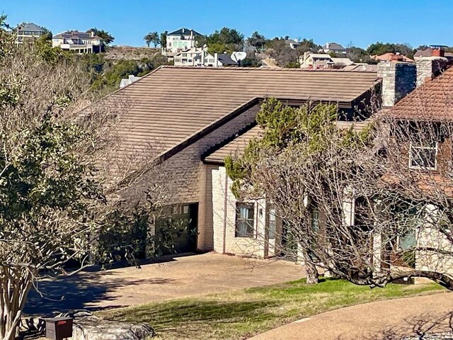 4324 Far W Blvd, Austin, TX 78731 - view of front of home with a tile roof and a residential view