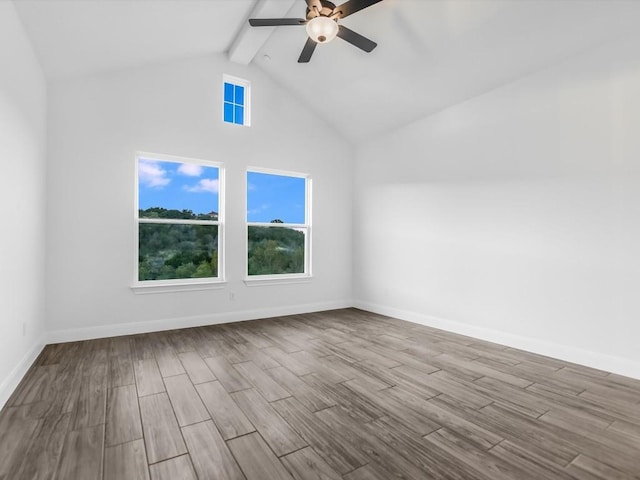 spare room with ceiling fan, light hardwood / wood-style flooring, and lofted ceiling with beams