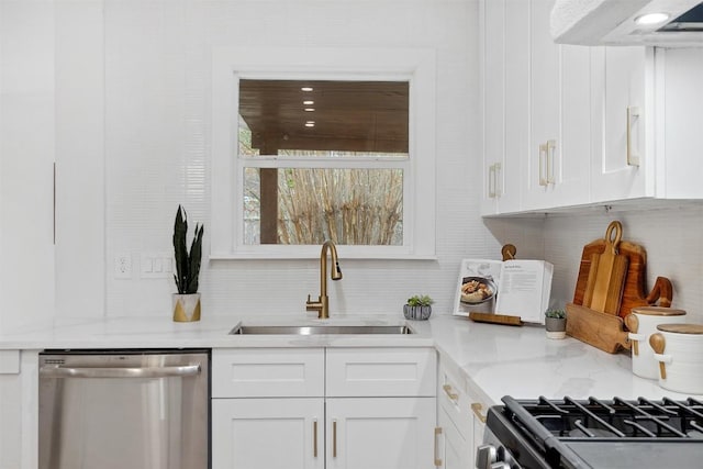 kitchen with light stone countertops, sink, stainless steel dishwasher, extractor fan, and white cabinets