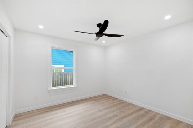 empty room featuring light hardwood / wood-style floors and ceiling fan