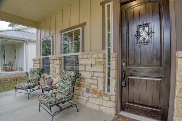 entrance to property with covered porch