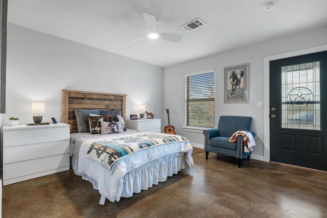 bedroom with multiple windows and ceiling fan