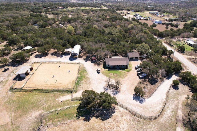 birds eye view of property with a rural view