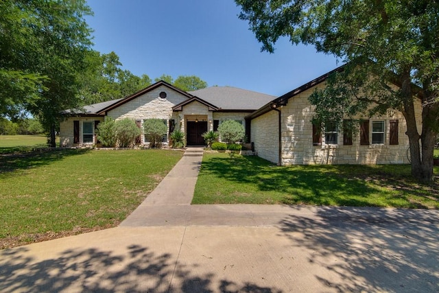 single story home with a front yard