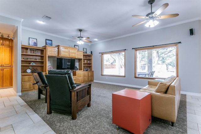 living room with tile patterned floors, ceiling fan, and crown molding