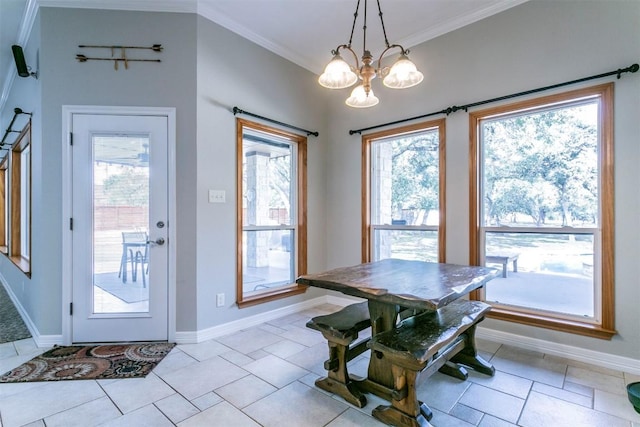 dining area with light tile patterned floors, an inviting chandelier, a wealth of natural light, and ornamental molding