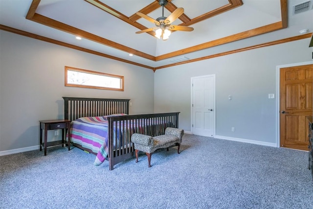 bedroom with ceiling fan, a raised ceiling, and ornamental molding