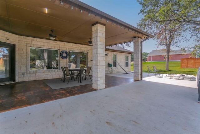 view of patio featuring ceiling fan