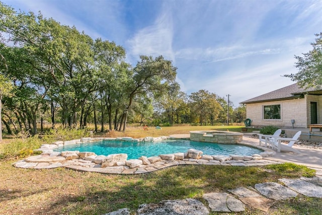 view of pool featuring an in ground hot tub and a patio