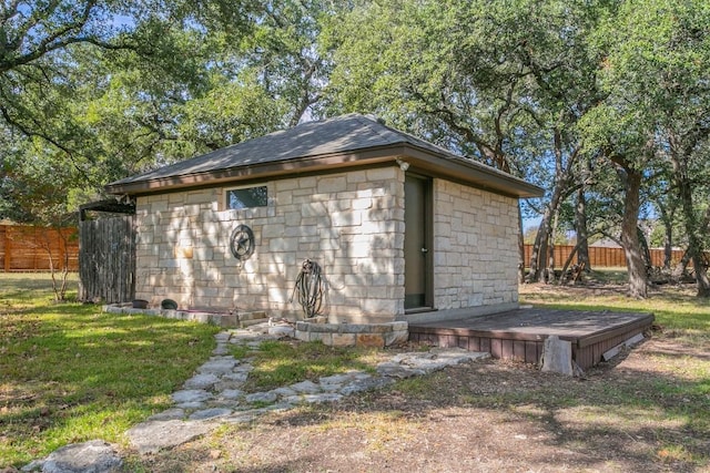 view of outdoor structure featuring a yard