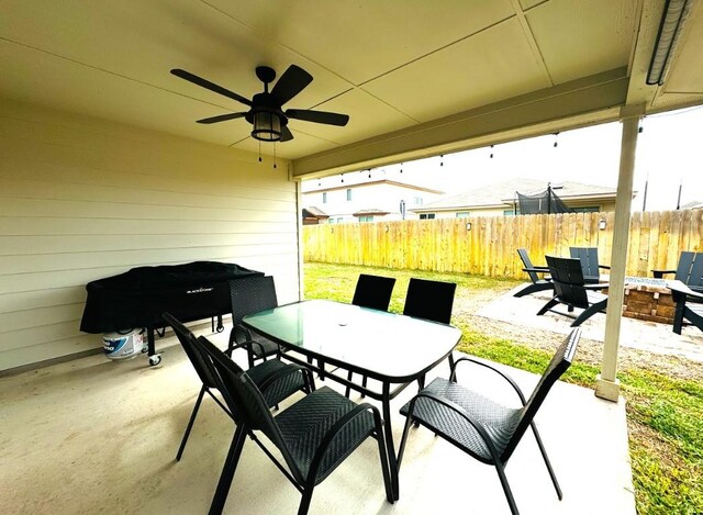 view of patio featuring ceiling fan