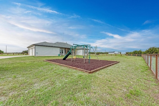 view of jungle gym with a lawn