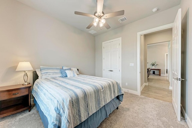 carpeted bedroom featuring ceiling fan