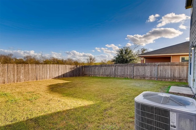 view of yard with central AC unit