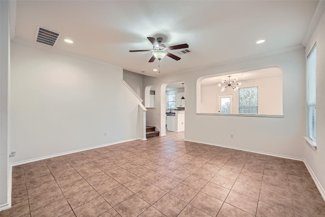 unfurnished living room featuring crown molding, light tile patterned flooring, and ceiling fan with notable chandelier