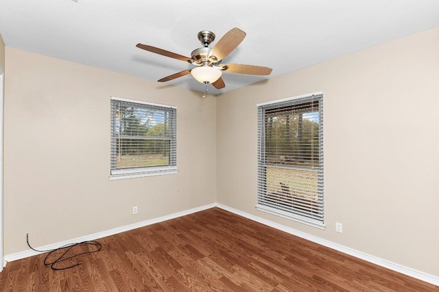 empty room with wood-type flooring and ceiling fan