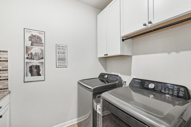 2912 Youngwood St, Leander, TX 78641 - washroom with cabinet space and washing machine and clothes dryer